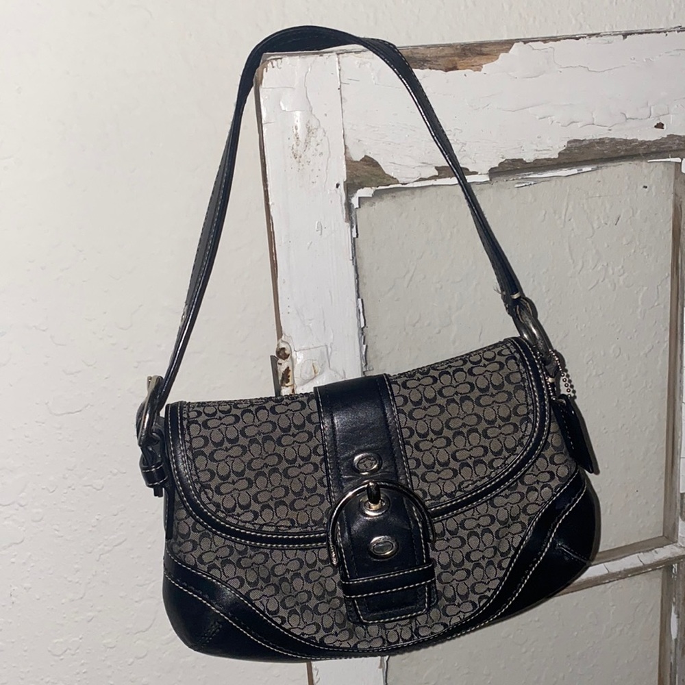 Black Coach purse with leather & buckle strap! 🖤